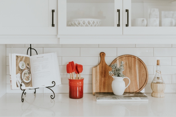 Kitchen counter with cookbook open.